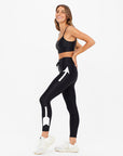 THE UPSIDE SUPER SOFT ARROW MIDI LEGGING